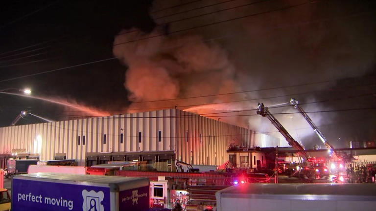 FDNY crews battle massive factory fire in Queens