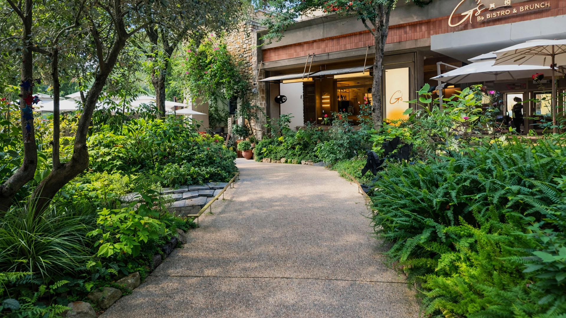 Green walkway experience between landscape garden and dining spot