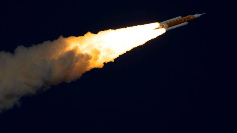 NASA completes historic moon voyage with vow of 'more to come'