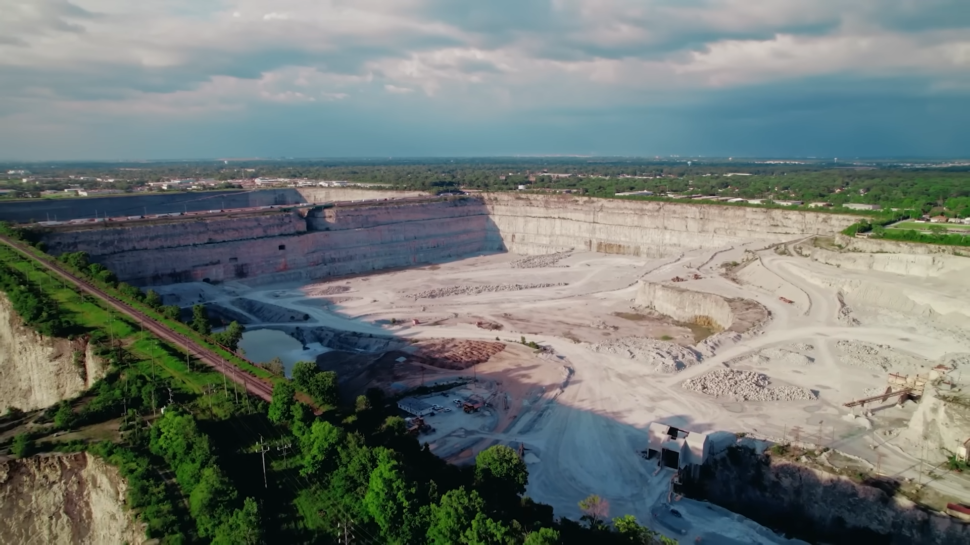 A highway runs through a massive quarry - and it was planned
