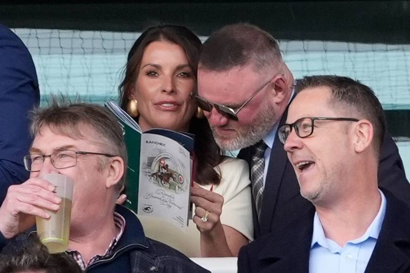 Coleen Rooney turns heads at Grand National as she celebrates with hubby Wayne at Aintree