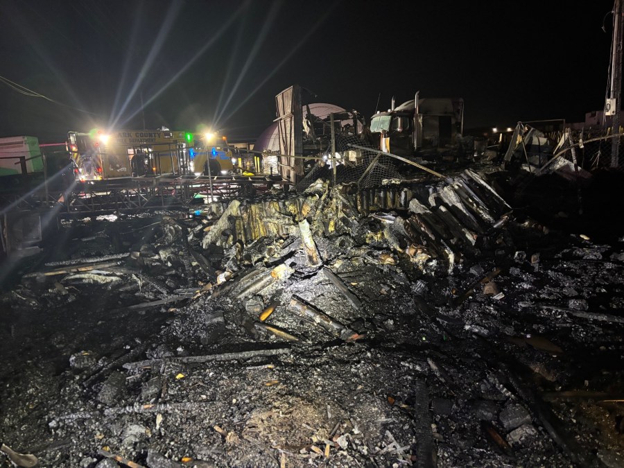 Fire crews battle structure fire size of city block in northeast Las ...