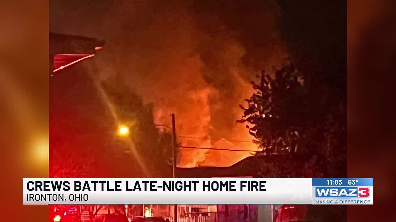 Crews battle late night house fire in Ironton