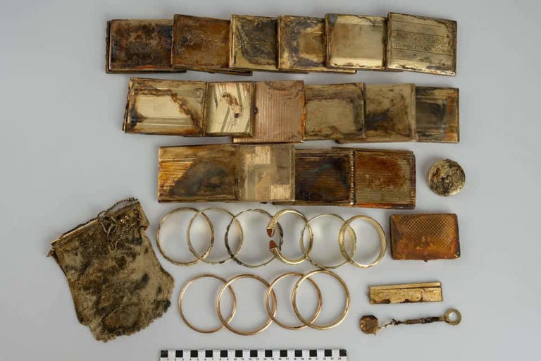 Two hikers found a simple aluminum can in the woods filled with nearly ...