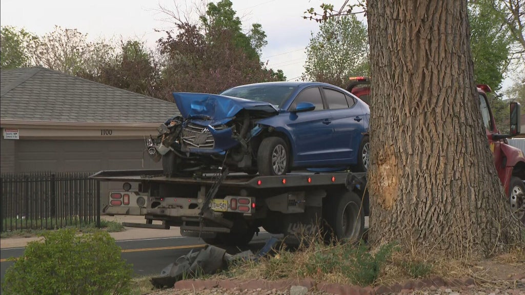 Aurora police say 14-year-old crashed stolen vehicle, two people in custody