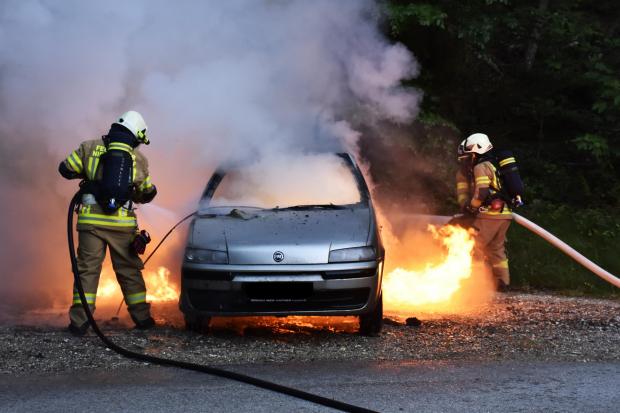 Dramatic scenes as fire engulfs three cars and damages a home