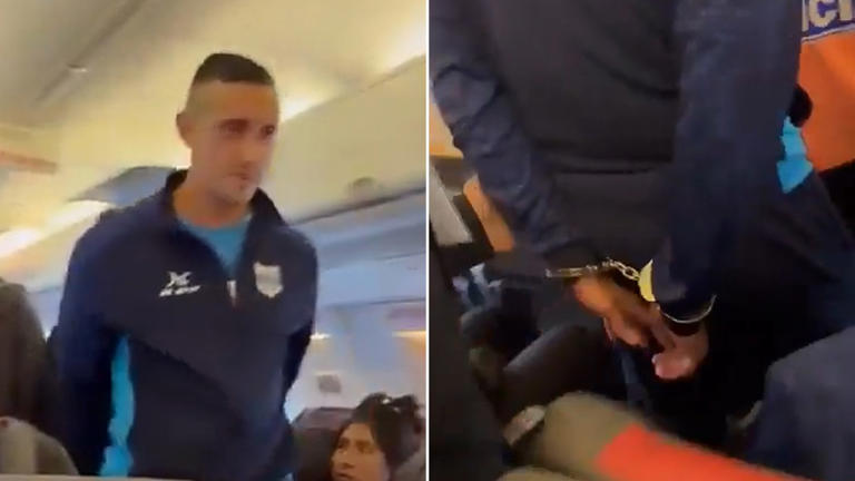 Footballer led off plane in handcuffs after yelling bomb ahead of team ...