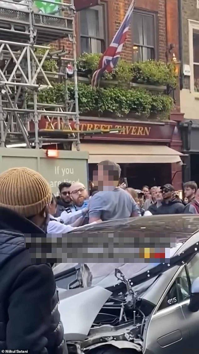Moment man is arrested after crashing stolen car into pedicab as it was ...