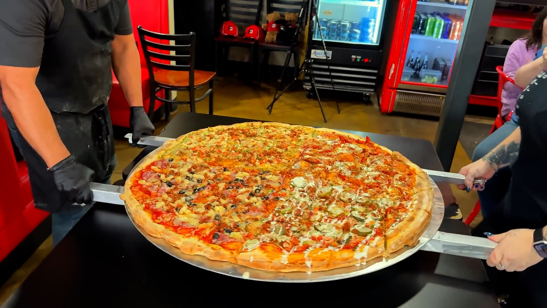 Two men attempt massive 36-inch monster pizza challenge with one-hour ...