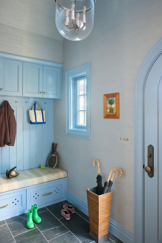 blue built-ins and trim in entryway