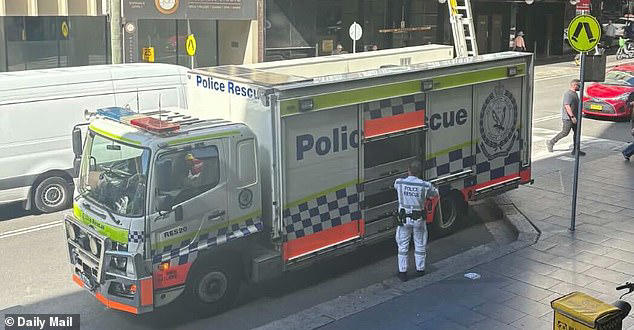 Emergency services rush to busy shopping centre as large area is ...