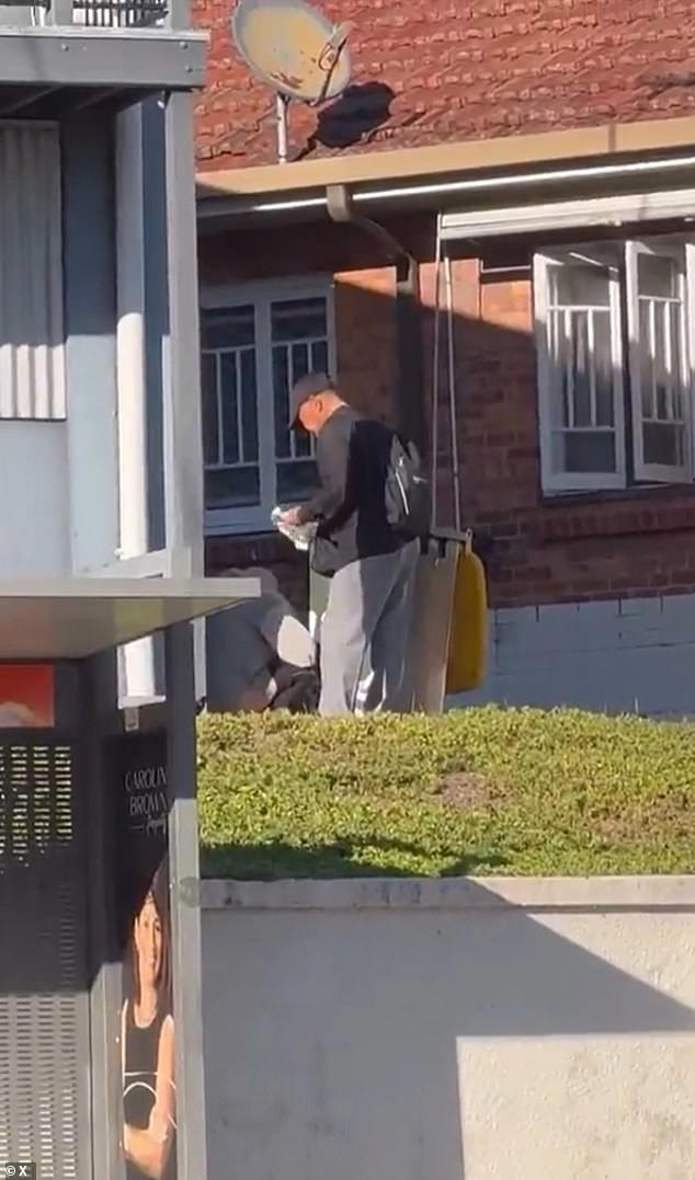 Disgusting moment woman defecates across the road from a cafe in a ...