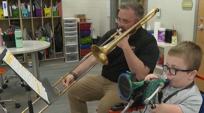 Andover 5th grader with dwarfism uses adaptive instrument to play in ...
