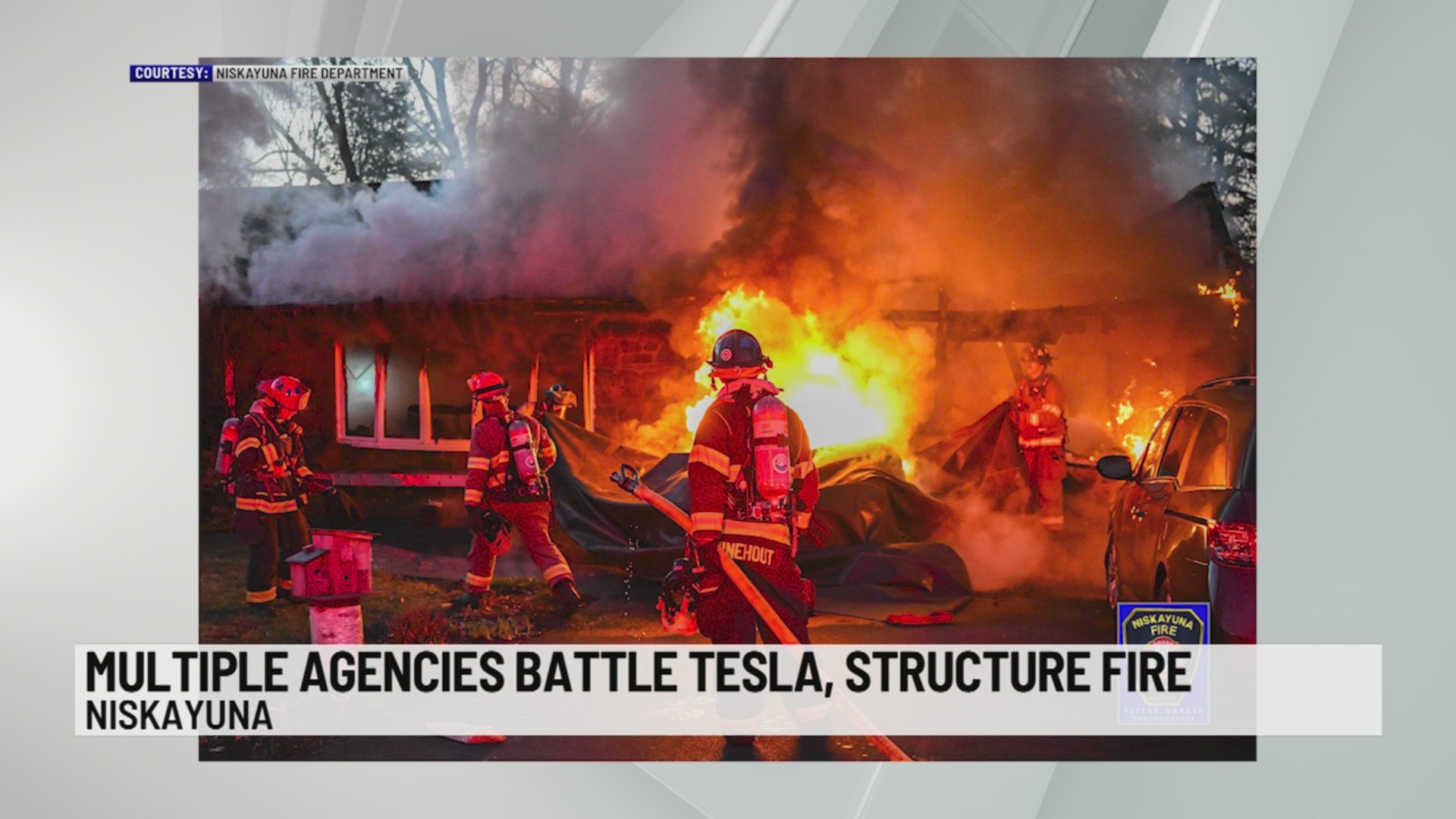 Multiple agencies battle Tesla structure fire