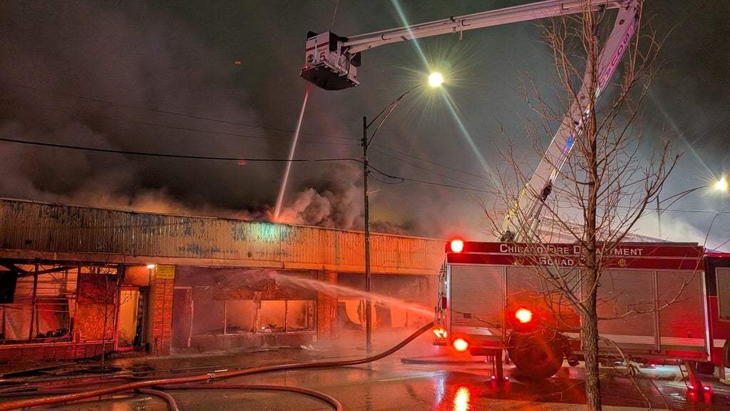 Firefighters battle blaze at vacant building in Chicago's Greater Grand ...