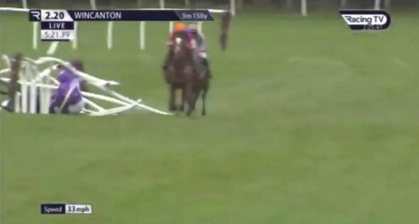 Grand National jockey's horse crashes into railings on verge of winning ...