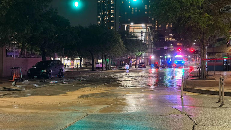 Water main break floods, closes intersection of Red River, 6th streets ...