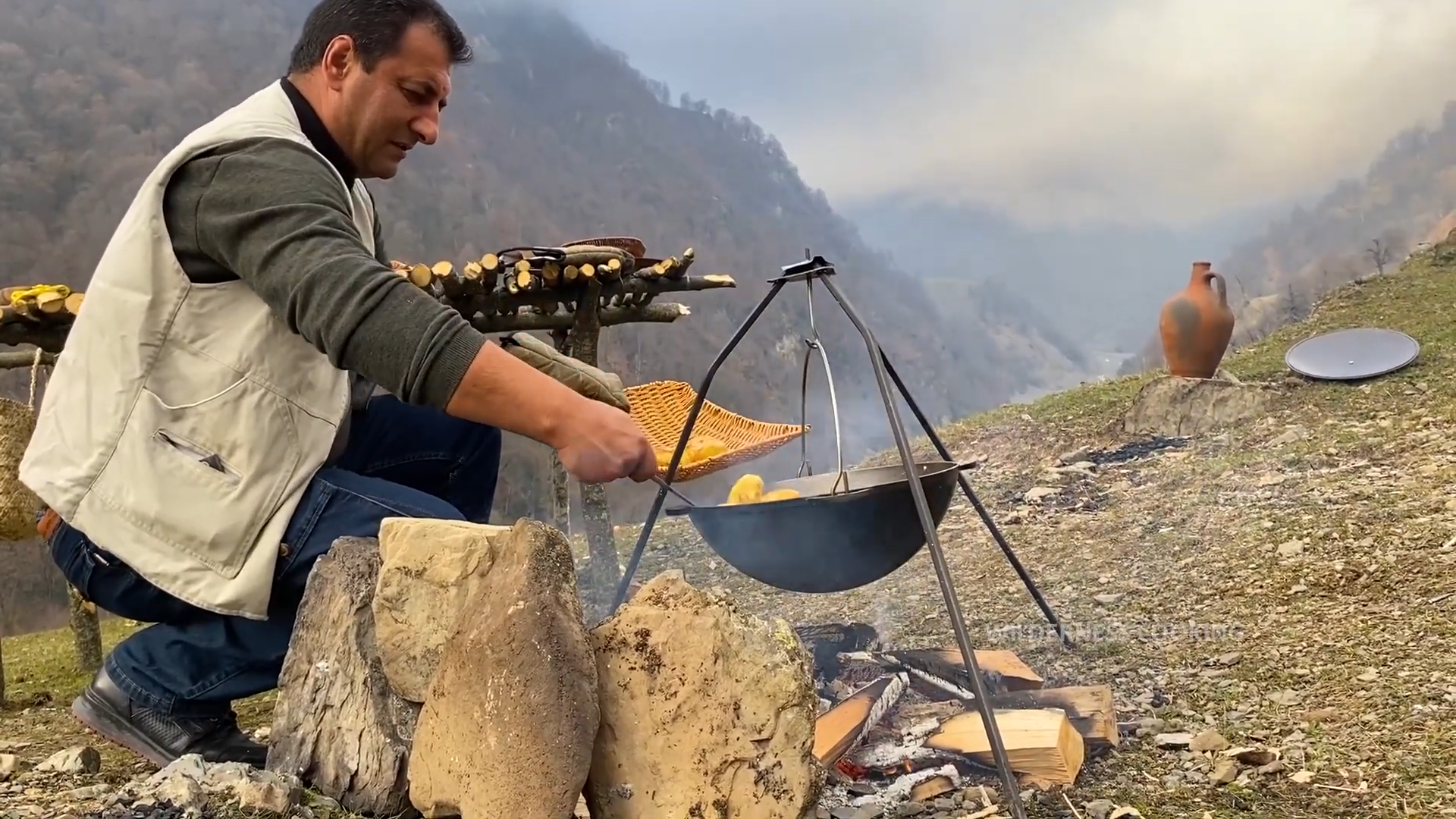 Cooking juicy duck with vegetables in the mountains