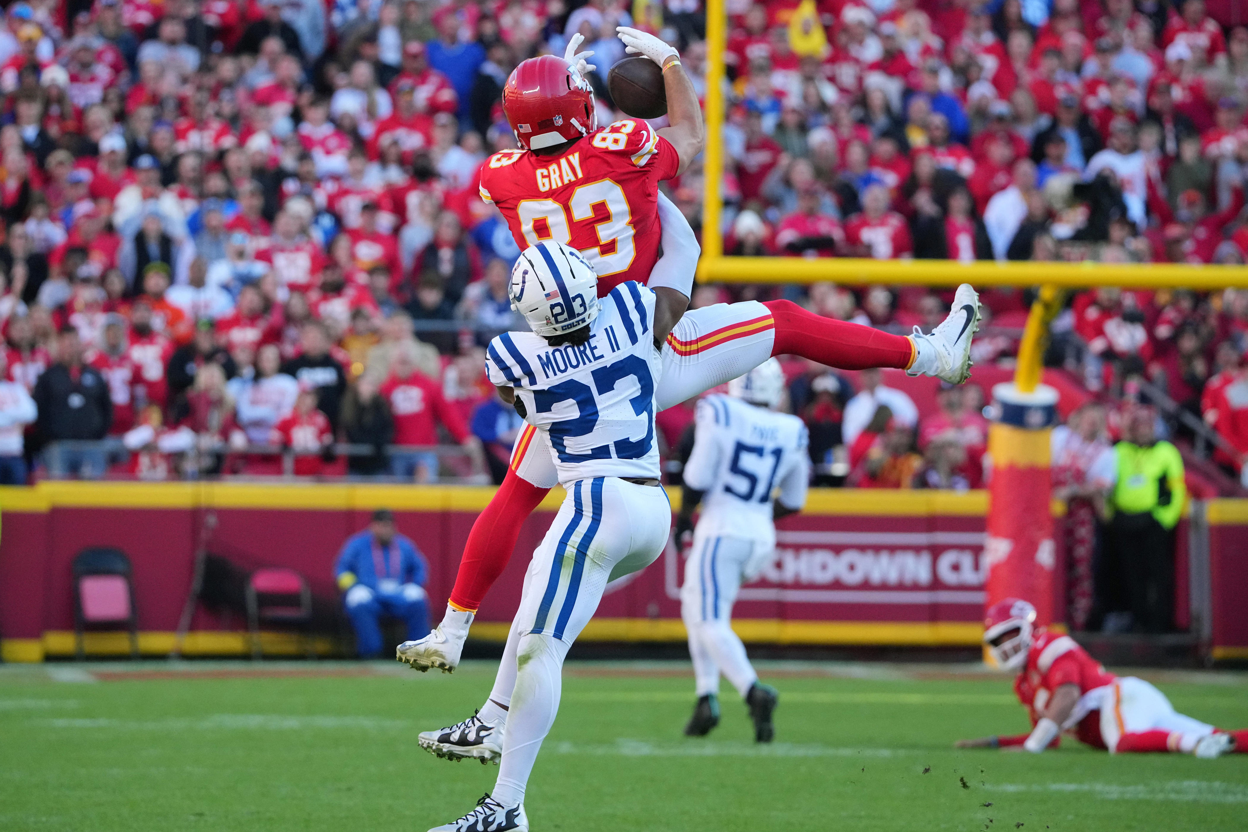 Nov 23, 2025; Kansas City, Missouri, USA; Kansas City Chiefs tight end Noah Gray (83) makes a catch against Indianapolis Colts cornerback Kenny Moore II (23) in the second half at GEHA Field at Arrowhead Stadium. Mandatory Credit: Denny Medley-Imagn Images