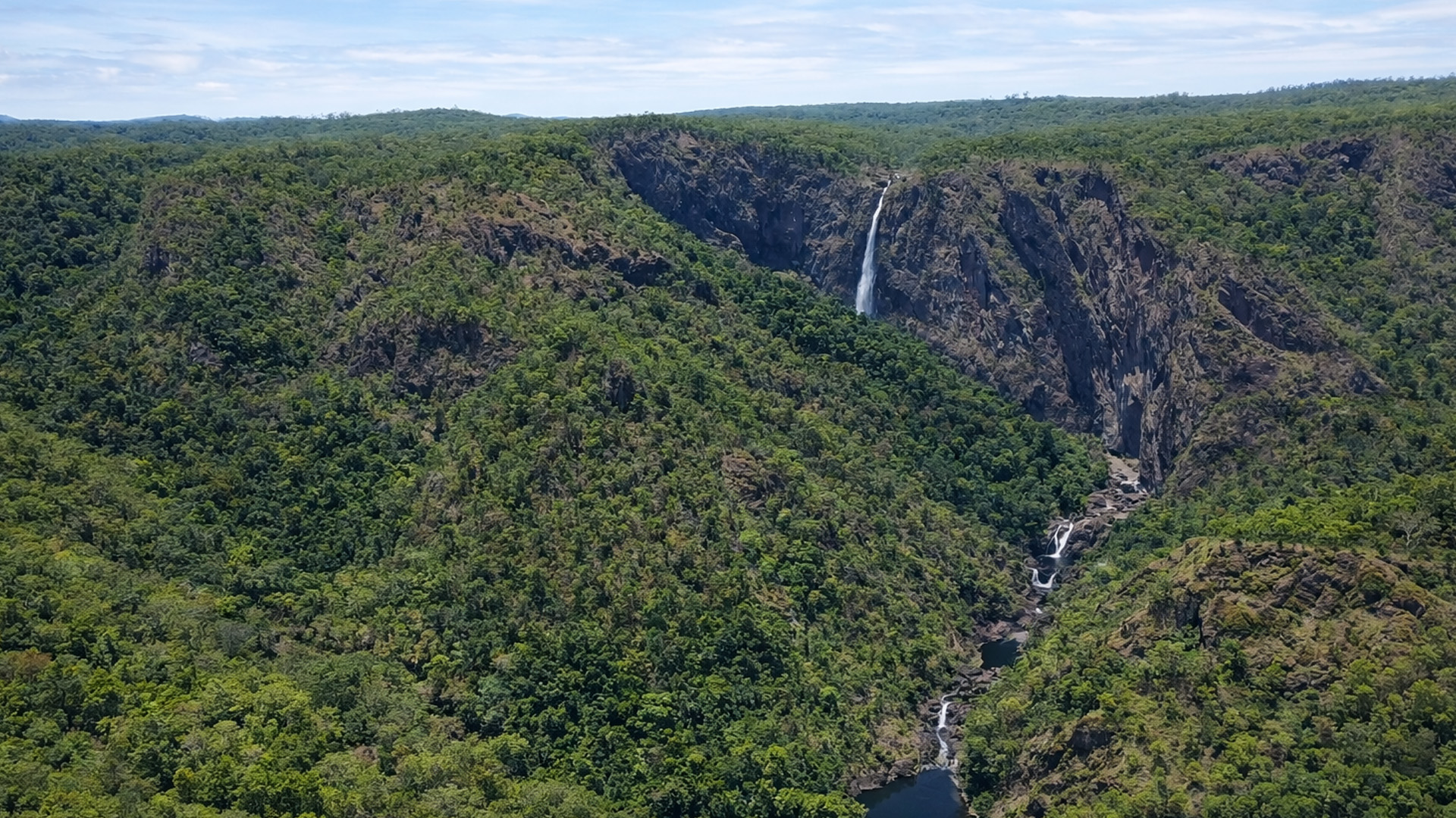 This waterfall flows through a deep valley