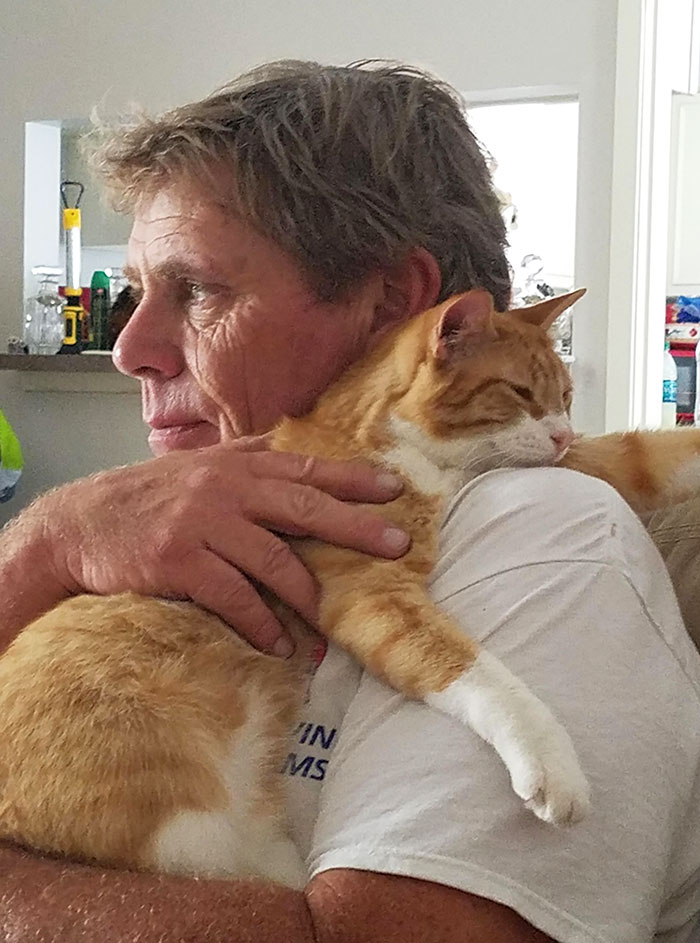 30 Adorable Photos Of Cat Dads And Their Furry Friends