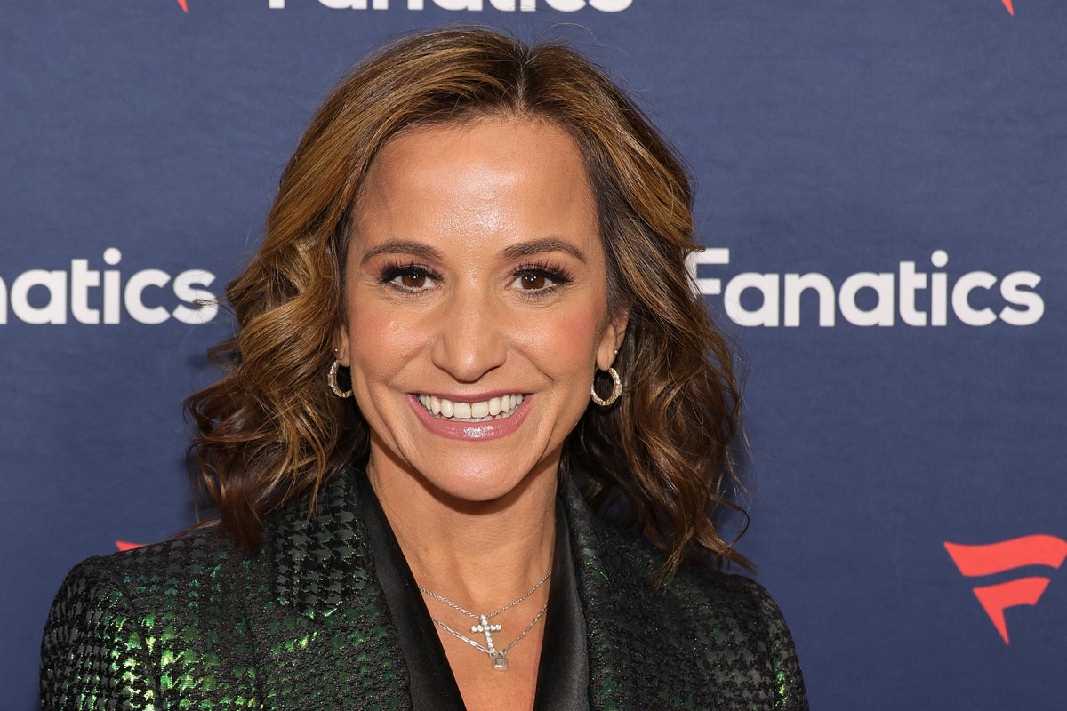 NFL reporter under investigation for holding hands with married coach