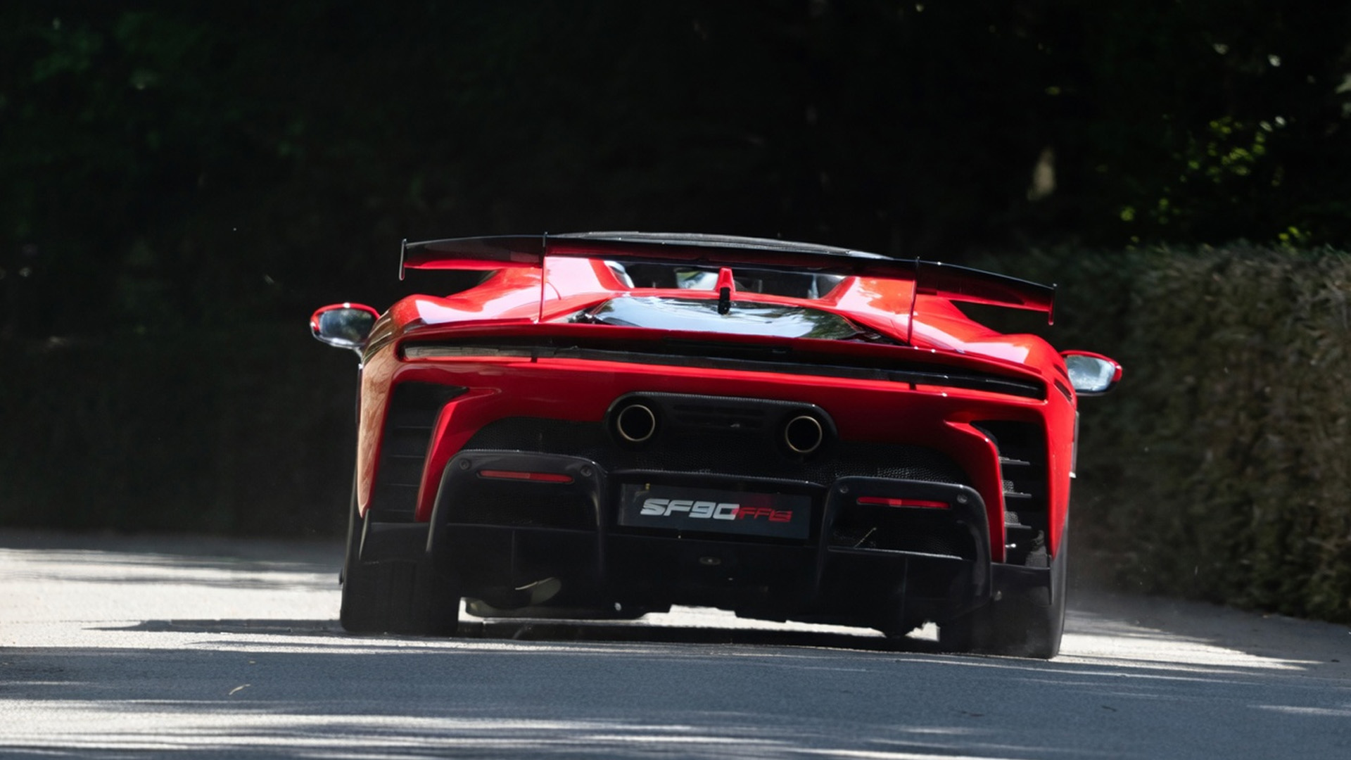 Ferrari SF90 pushes limits on a tight circuit turn