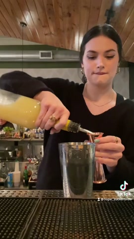 Watch this bartender build a flaming fire and spice cocktail