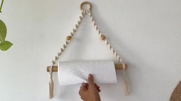 Turn string and a rod into the cutest place to keep paper towels