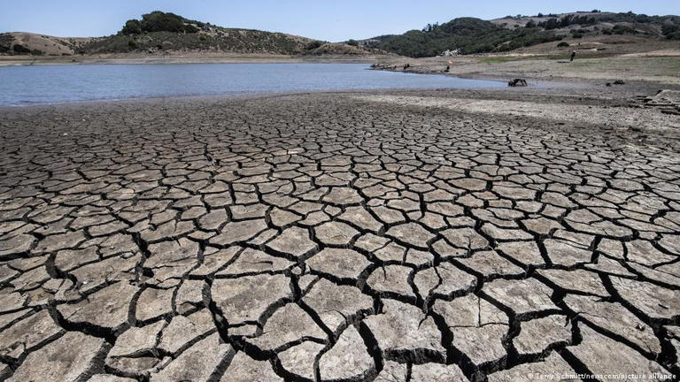 Water is scarce, as seen in this dried lake bed in the sun at Nicasio Reservoir in Nicasio, California