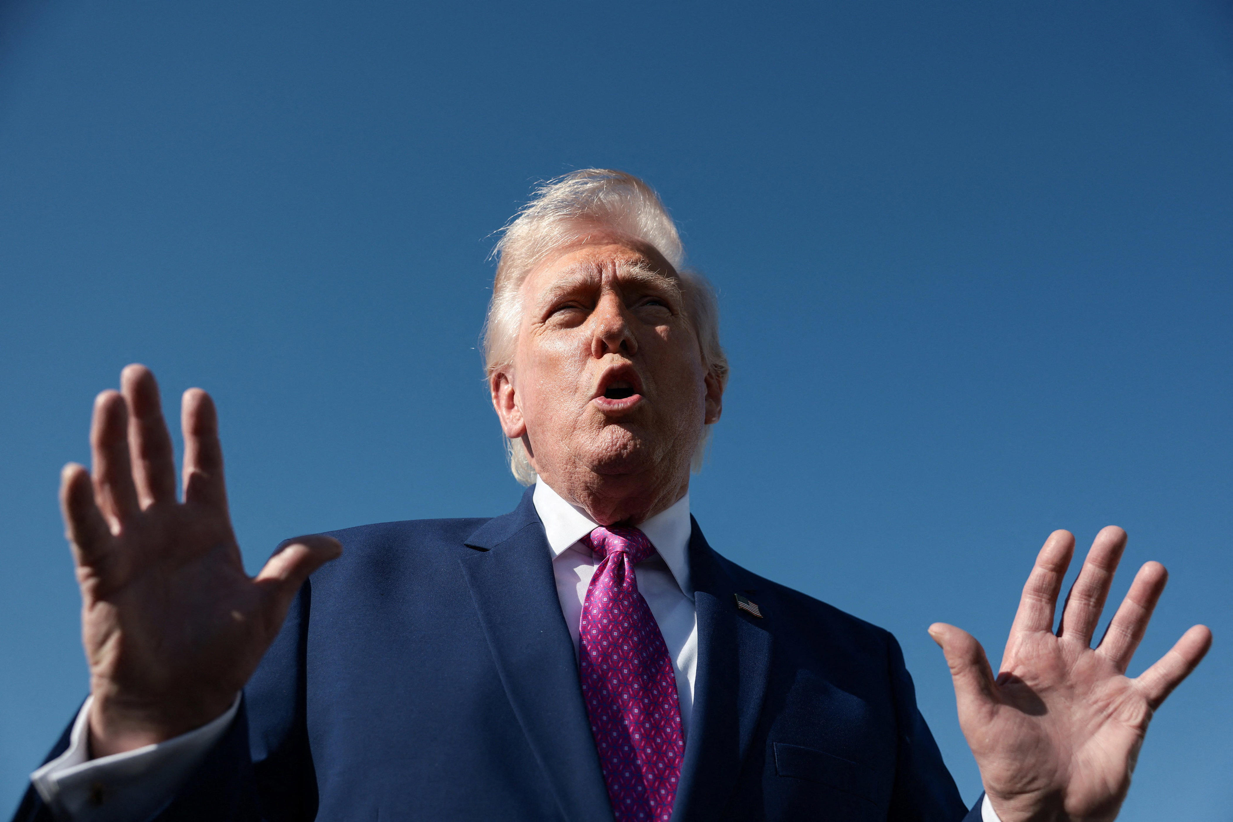 President Donald Trump speaks to reporters before boarding Air Force One at Joint Base Andrews in Maryland on April 10, 2026.