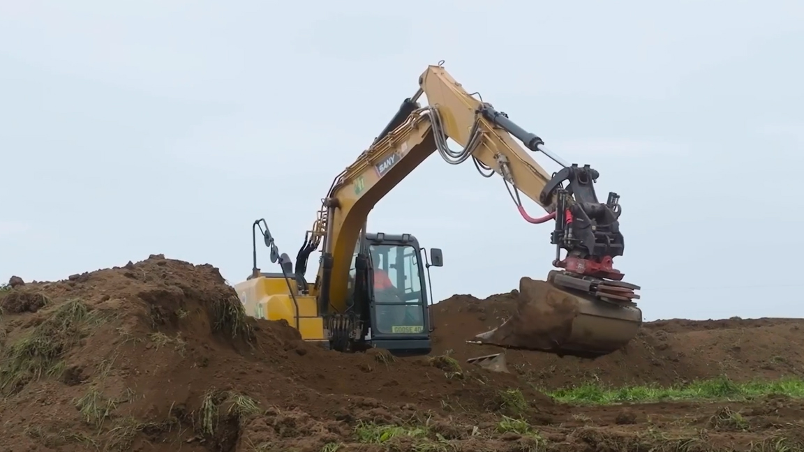 This massive machine uses smart tools to handle tough terrain