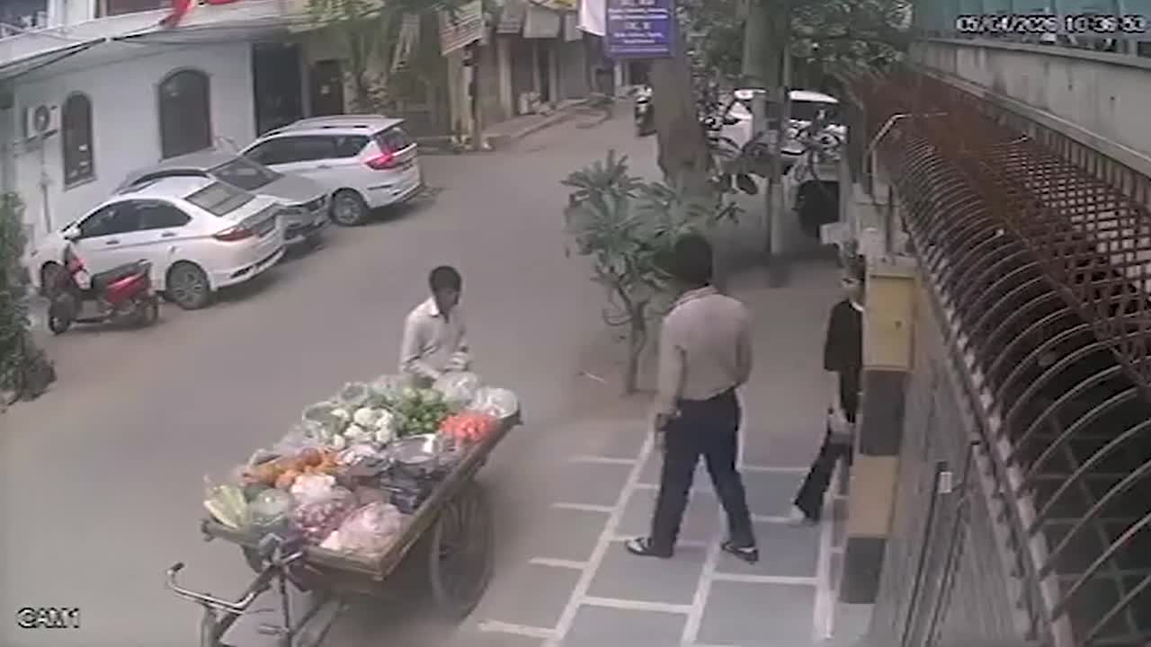 Split-second reaction as hero dad takes hit from speeding car to save ...