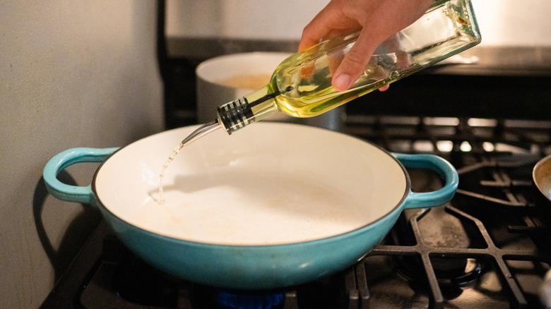 The best time to add oil to your pan, depending on the type you're using