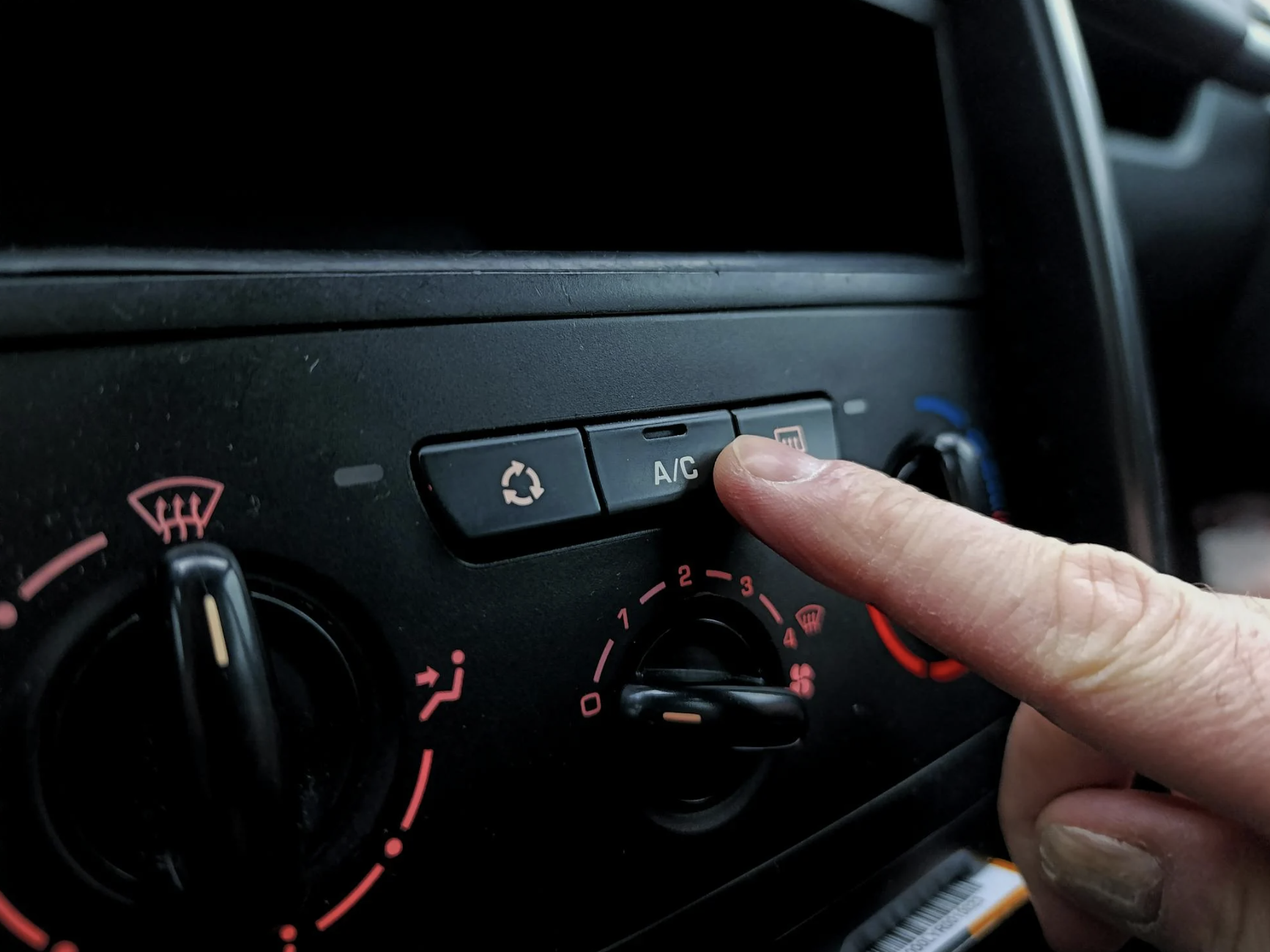 That little AC button could save you $150 this summer