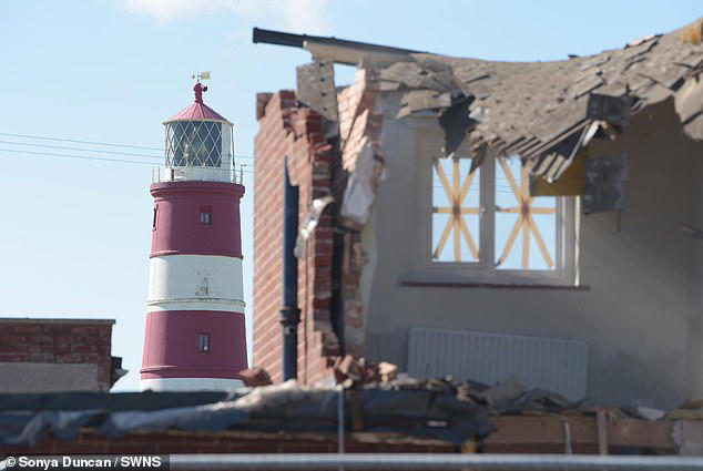 Bulldozers demolish three houses in erosion hit Norfolk village: Cliff ...