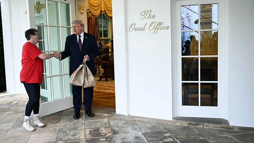 Trump's McDonald's delivery with 'DoorDash grandma' sparks staging debate