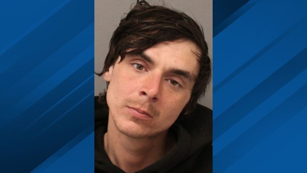 Man charged after woman carjacked while shopping