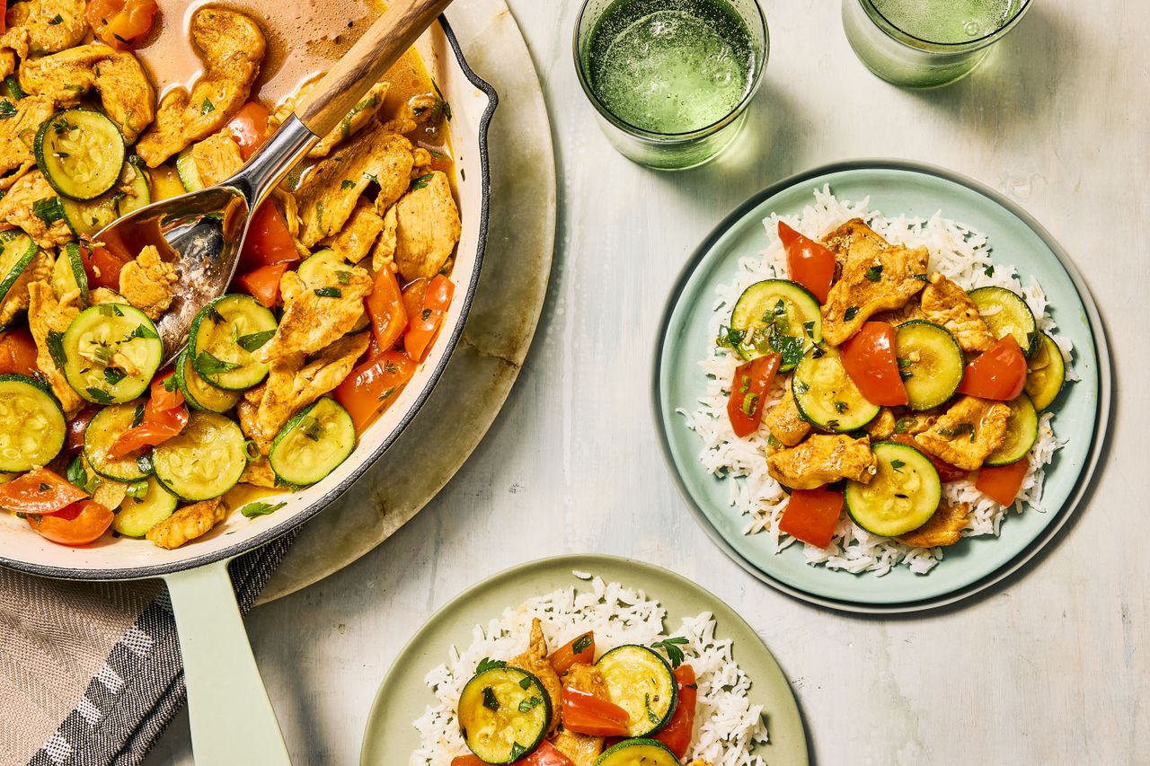 Southern Living Creole Chicken Skillet ready to serve with rice
