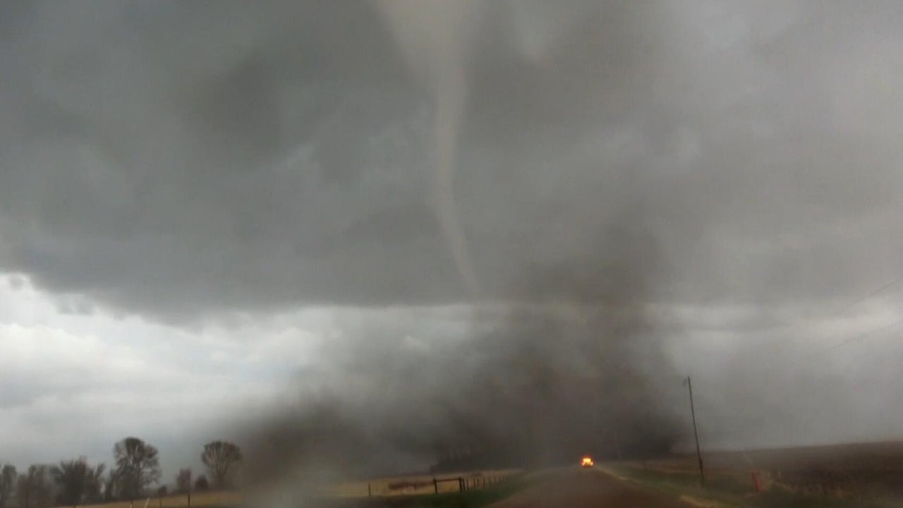 Purple skies, tornadoes and hail seen across US.: Here