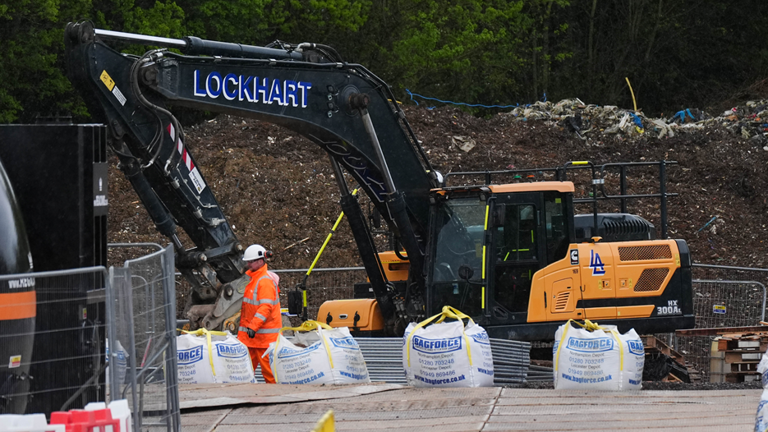 Work begins to remove giant illegal waste tip