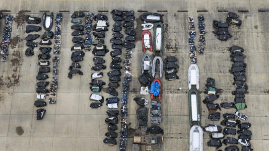 A view of small boats and outboard motors used by people thought to be migrants to cross the Channel (PA)