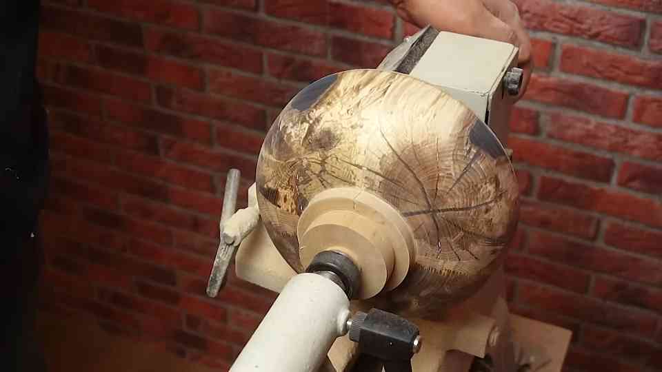 Woodturning a log with a touch of blue
