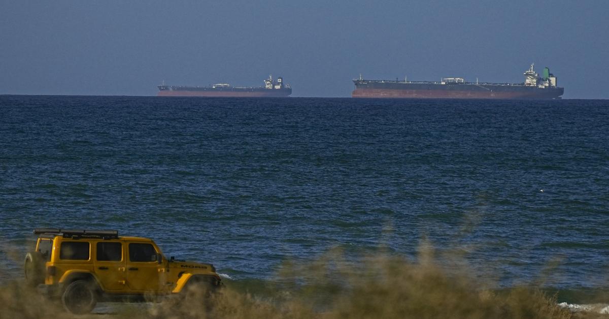 Iran fires upon and takes custody of two vessels in Strait of Hormuz