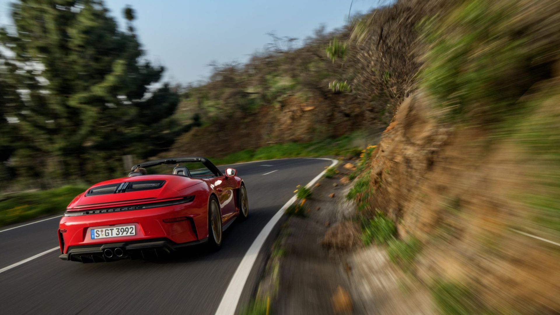 Photos: Porsche's new open-top sports car delivers 502 hp, hits 0-60 ...