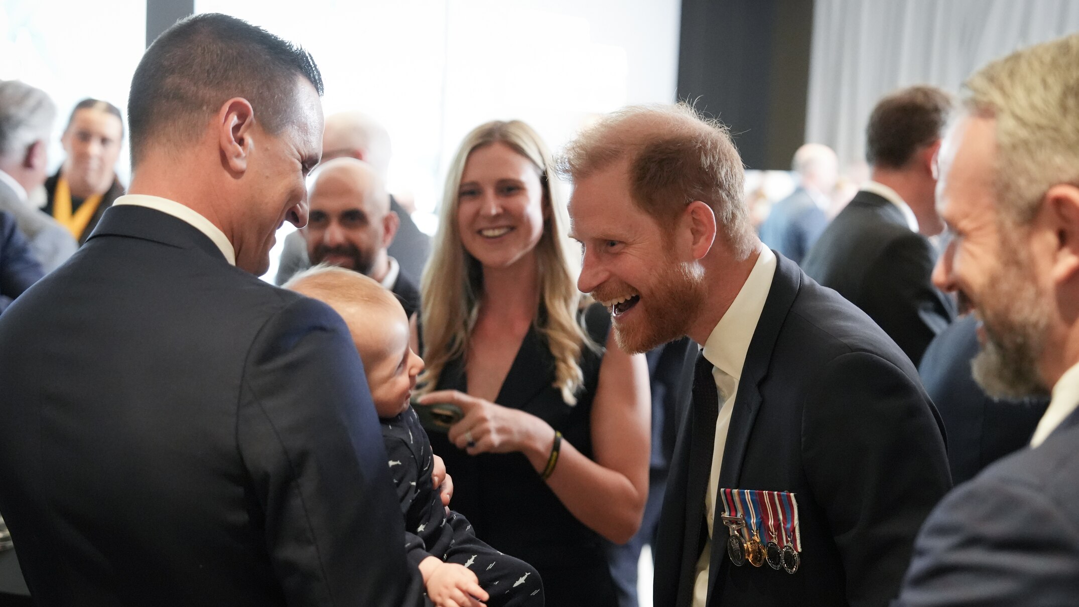 Duke of Sussex mingles with attendees at Invictus event after sombre ...