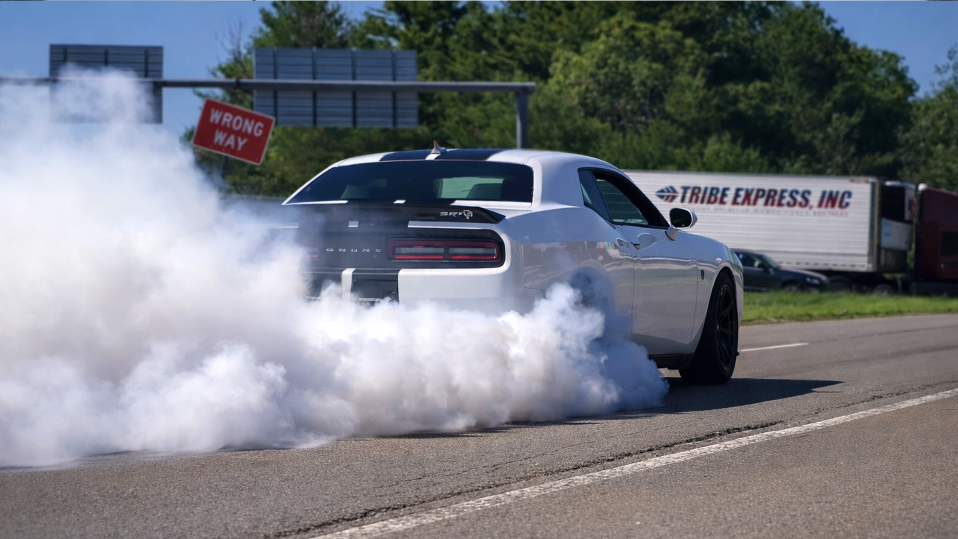 Hellcat unleashing raw power with massive smoke burnout