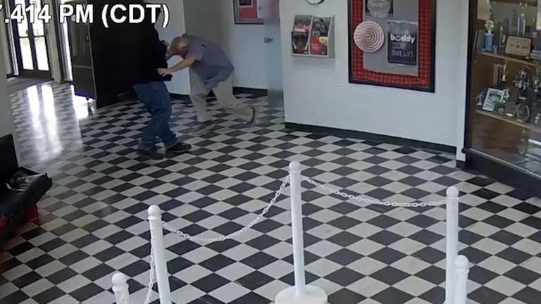 Security footage shows principal tackle gunman at Oklahoma school