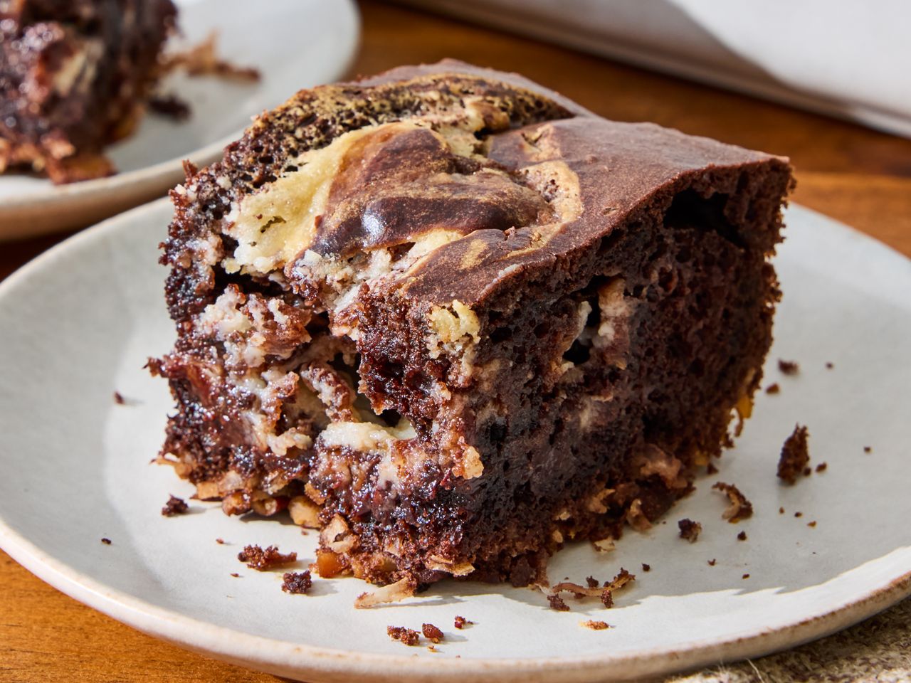 A piece of German chocolate dump cake on a plate