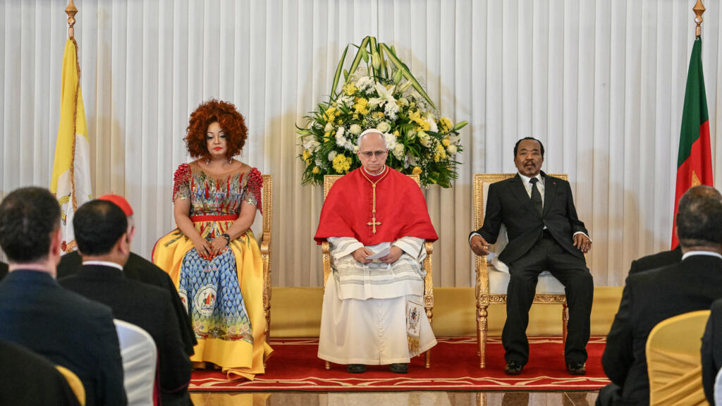 Pope Leo XIV (C) meets with Cameroon's President Paul Biya (R) and Cameroon's First Lady Chantal Biya (L) at the Presidential Palace in Yaounde on the third day of an 11-day apostolic journey to Africa on April 15, 2026.